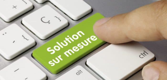 Photo d'un clavier avec une touche "Solution sur mesure"